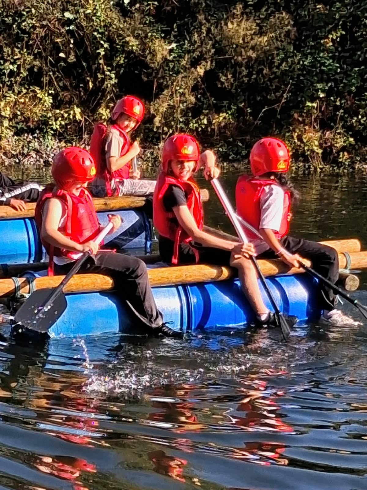 Year 5 & 6 children building and testing rafts