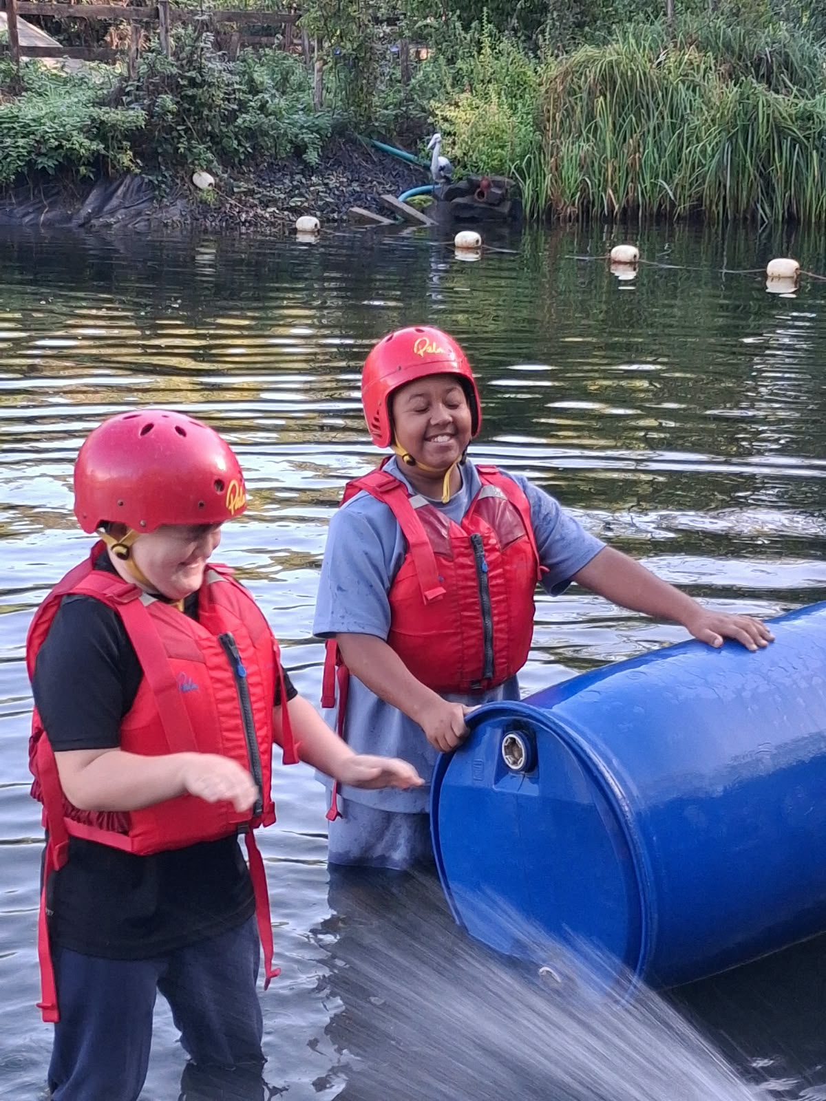 Year 5 & 6 children building and testing rafts