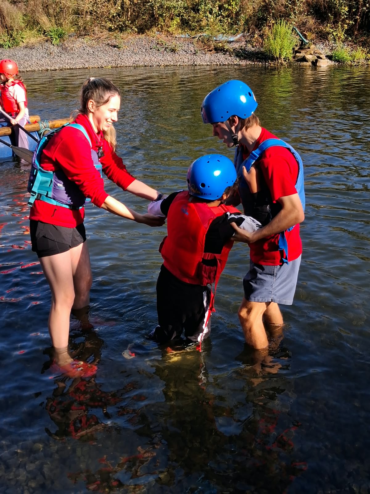 Year 5 & 6 children building and testing rafts