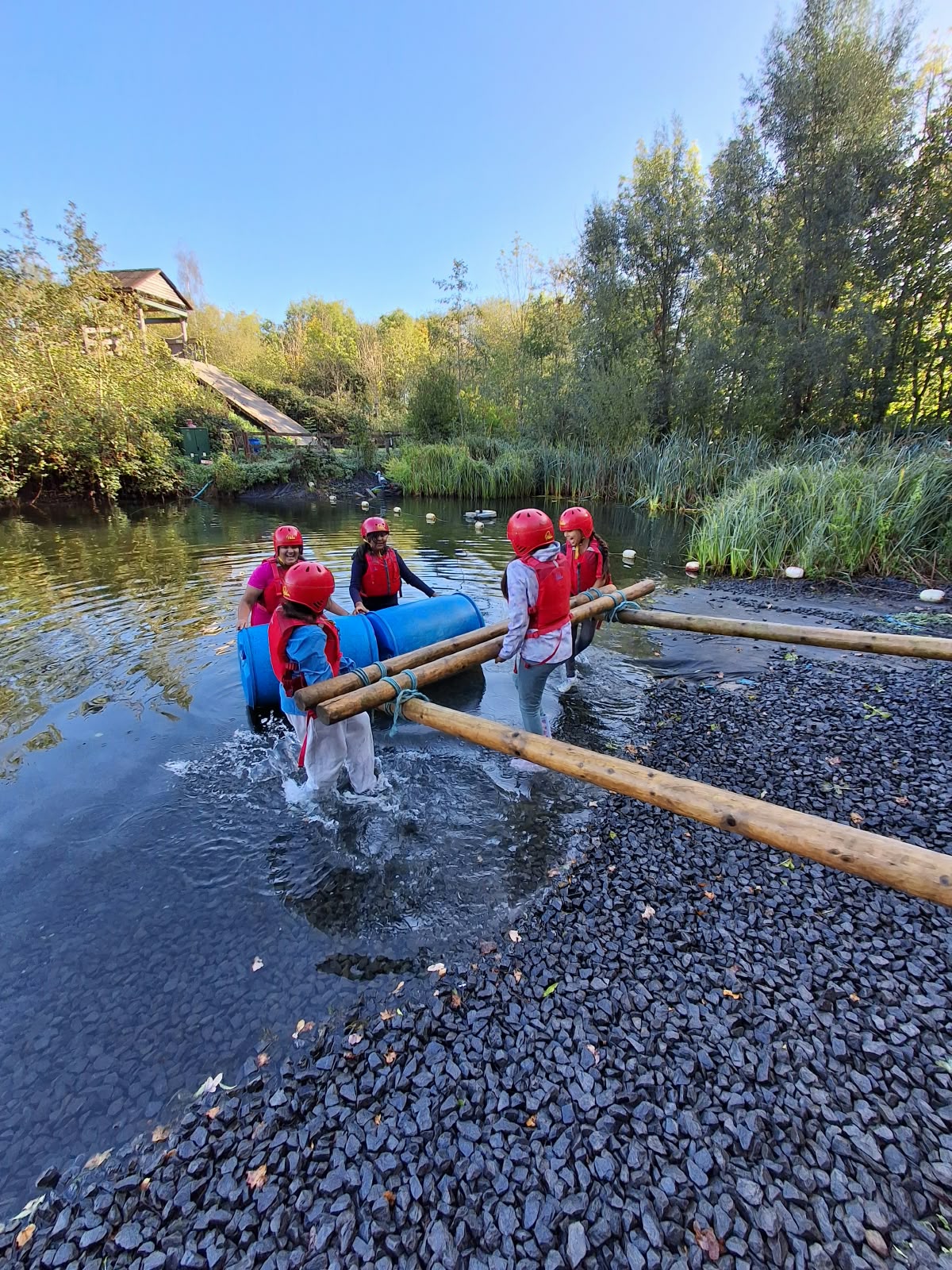 Year 5 & 6 children building and testing rafts