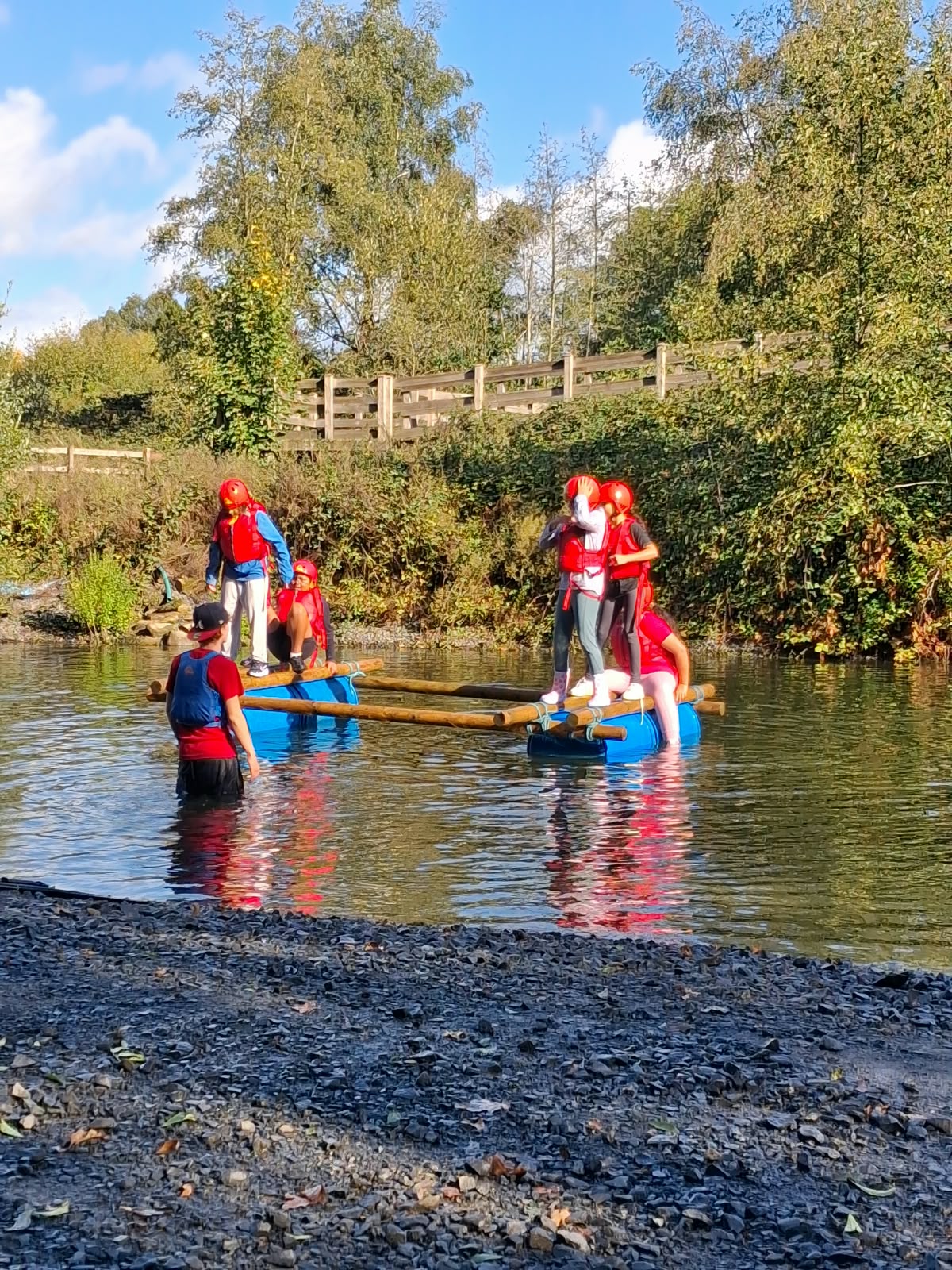 Year 5 & 6 children building and testing rafts