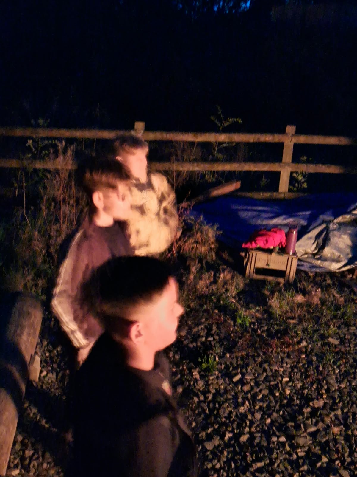 Year 5 & 6 children around a campfire