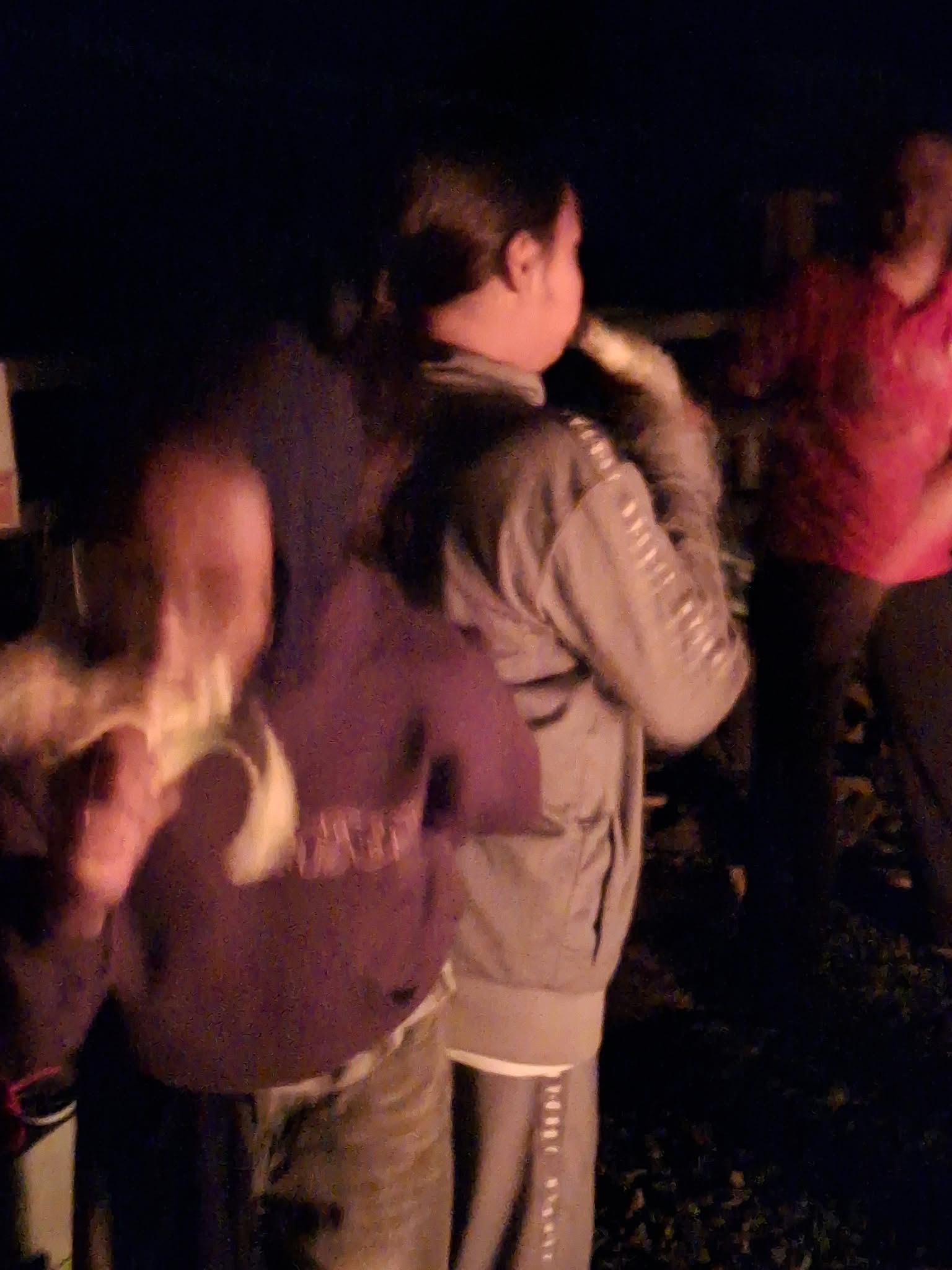 Year 5 & 6 children around a campfire