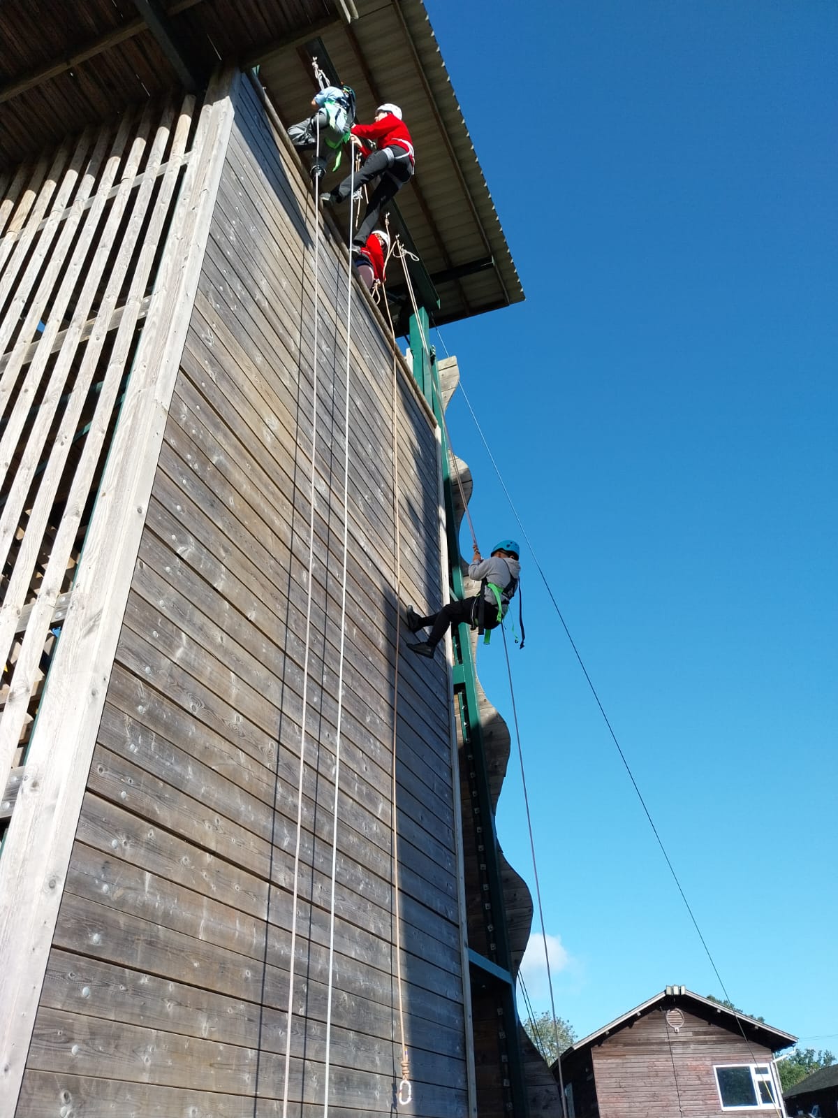 Group 2 children doing abseiling and zip wire