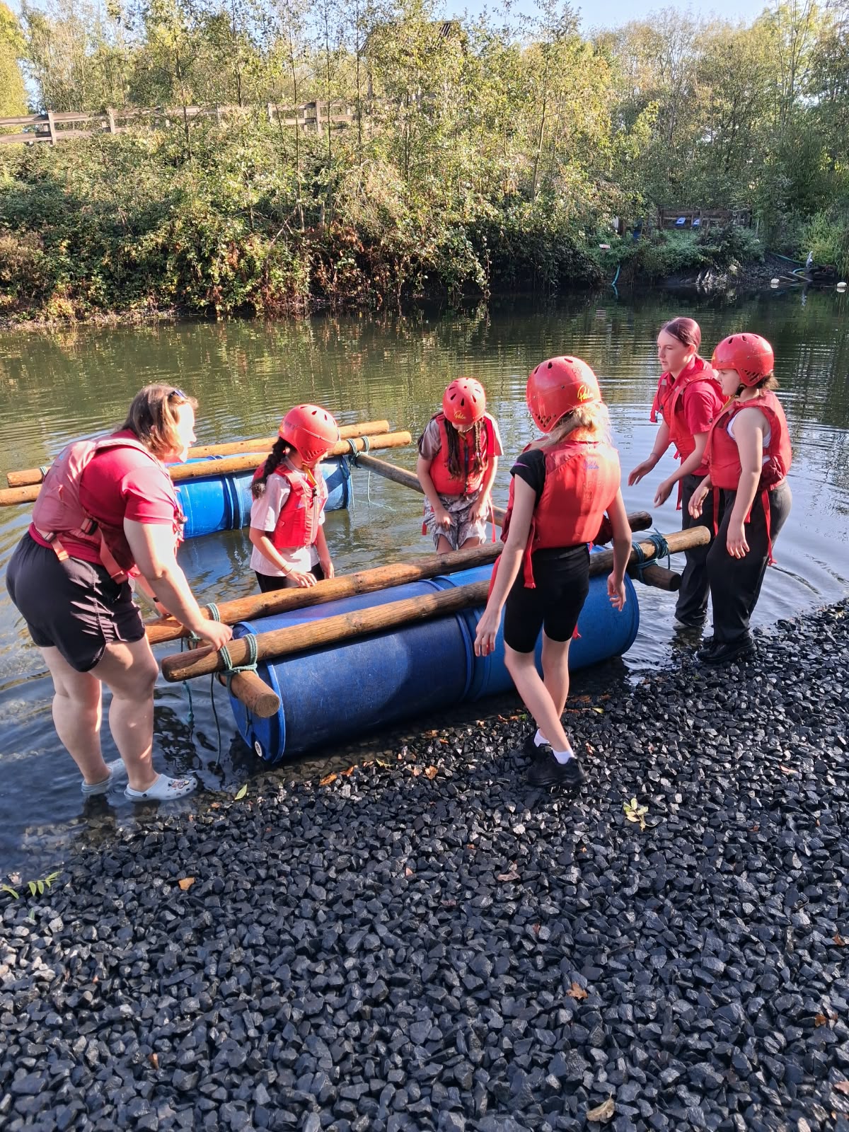 Year 5 & 6 children building and testing rafts